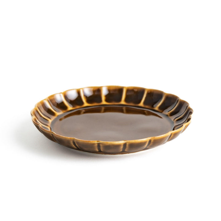 Round, dark brown or olive colored dessert plate with a scalloped edge, featuring a glossy finish.
