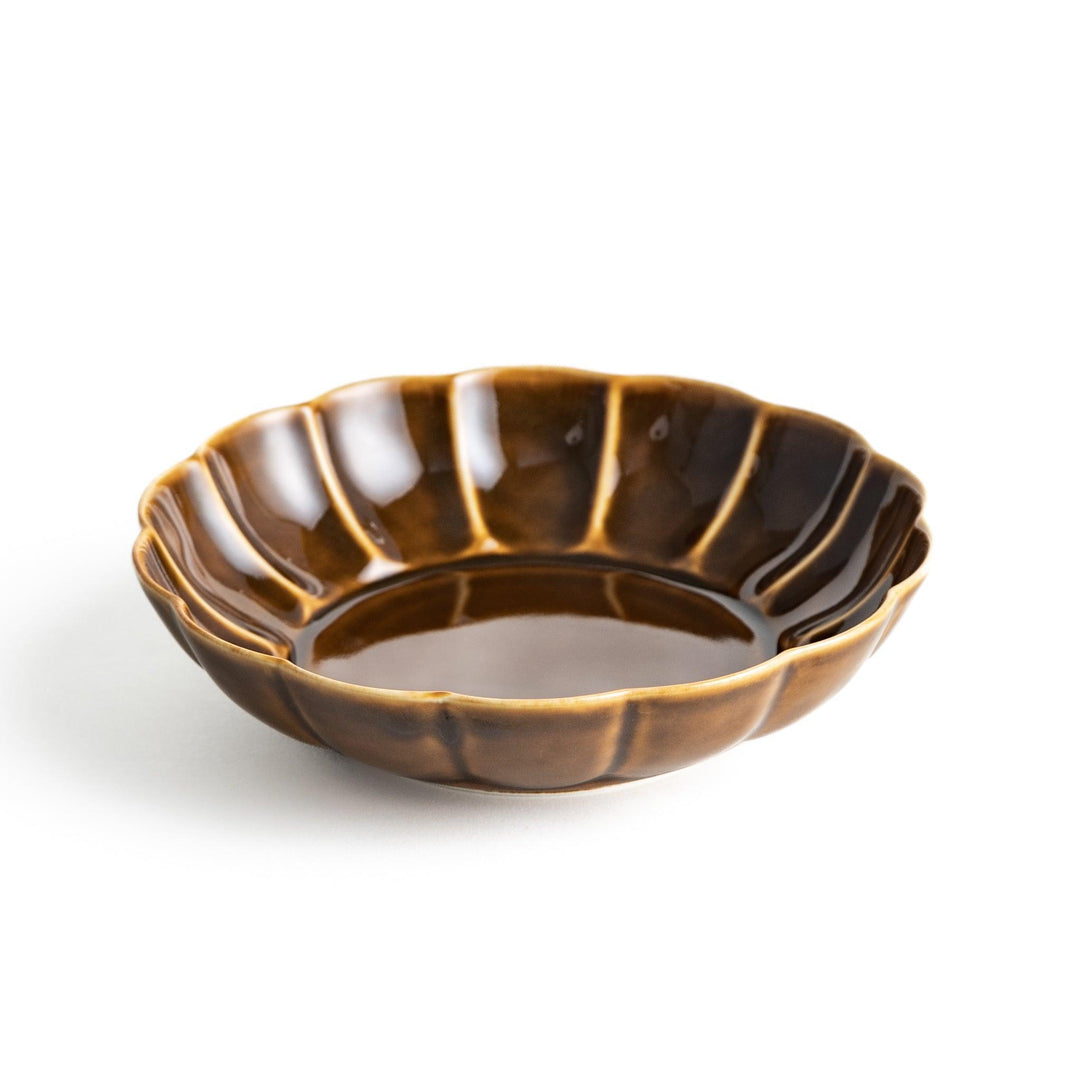 Cereal bowl with scalloped edges and a glossy dark brown or olive finish.