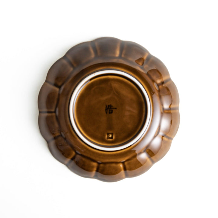 Cereal bowl with scalloped edges and a glossy dark brown or olive finish.