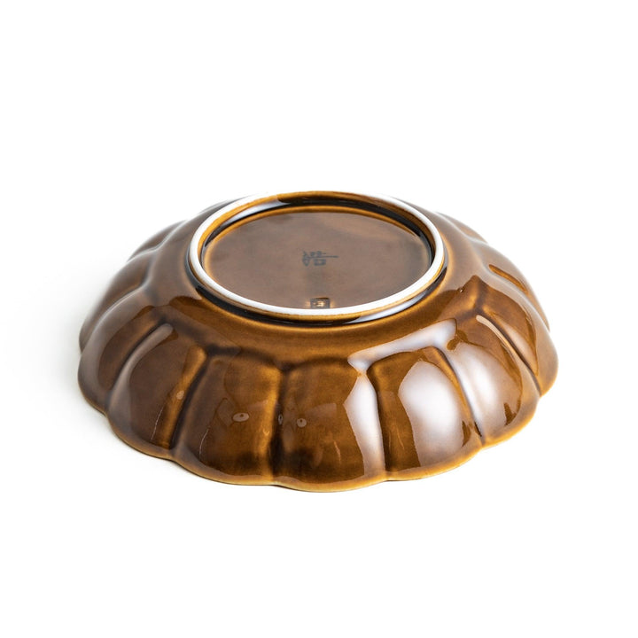 Cereal bowl with scalloped edges and a glossy dark brown or olive finish.