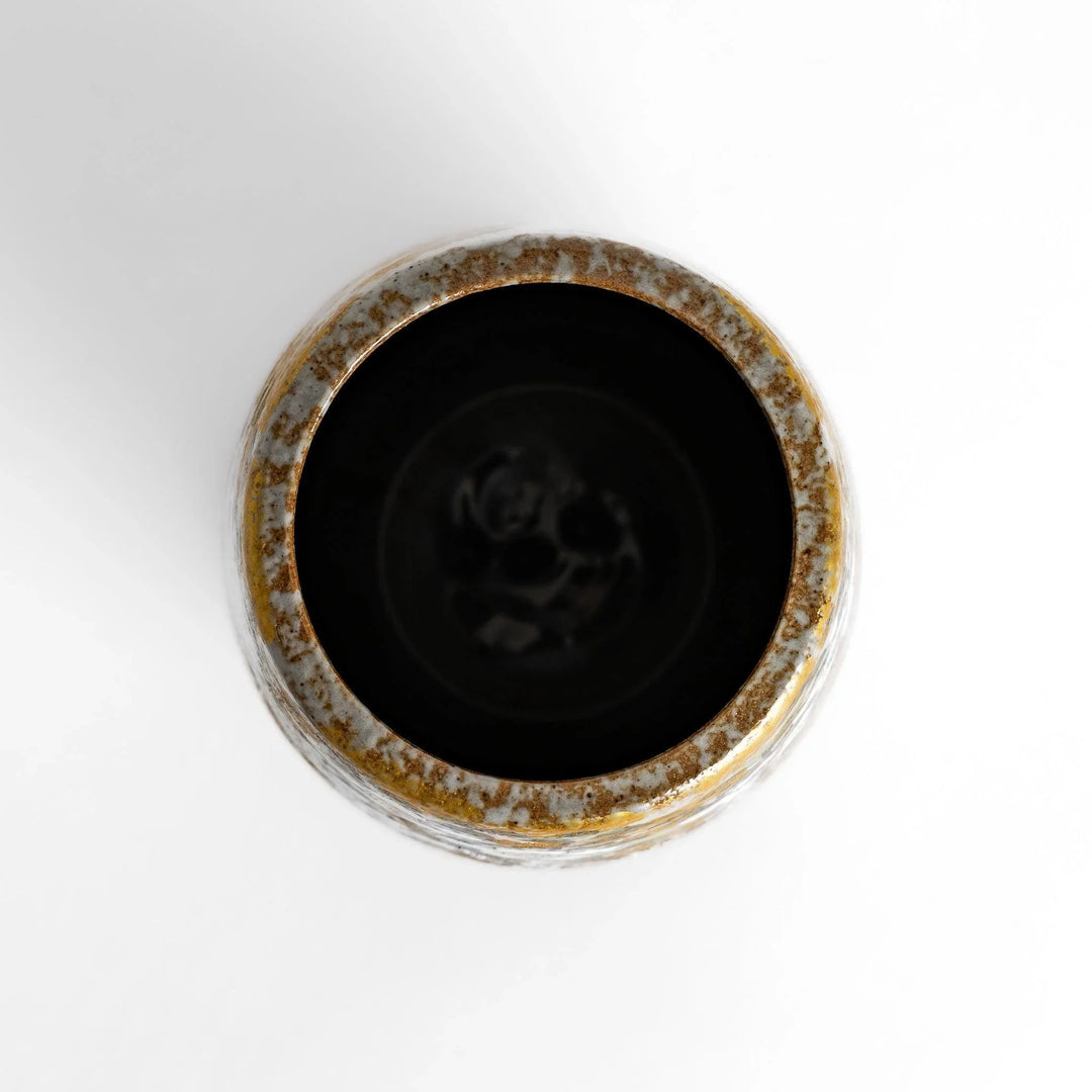 Flower vase with hand painted blooms and perched bird in warm gold and green tones for refined display.