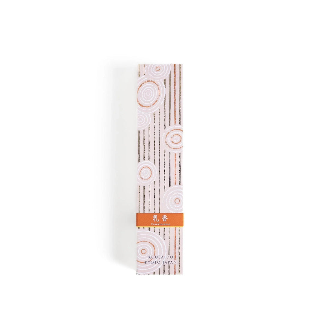 Japanese frankincense incense sticks in a wooden box with an orange patterned sleeve from Kyoto’s Kousaido