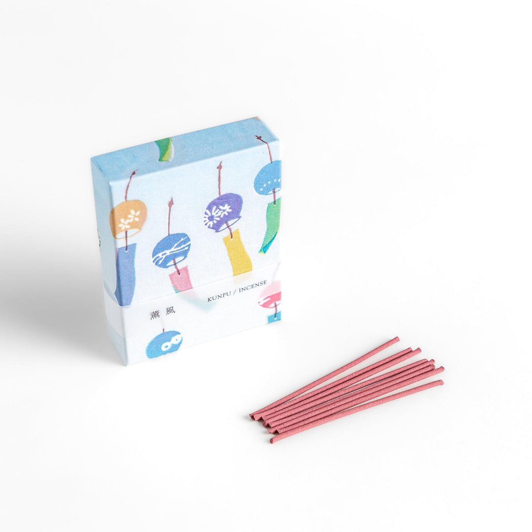 Incense with pink sticks in a wind chime design box evoking a light refreshing fragrance of a gentle summer breeze.