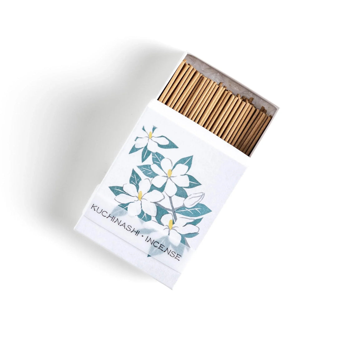 Incense with beige sticks in a gardenia box, offering a rich floral fragrance for a calm and soothing ambiance