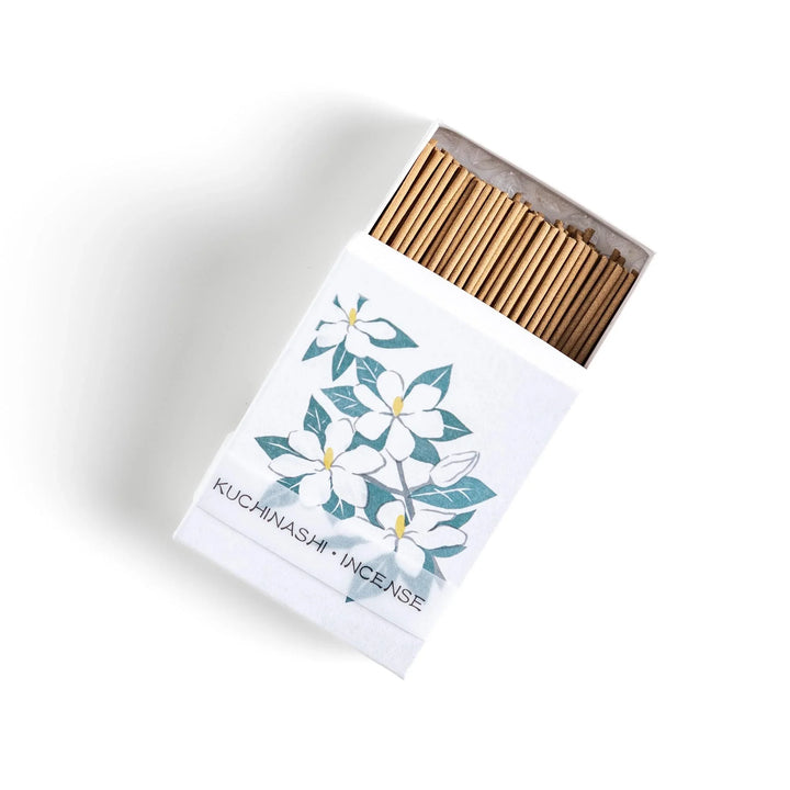 Incense with beige sticks in a gardenia box, offering a rich floral fragrance for a calm and soothing ambiance