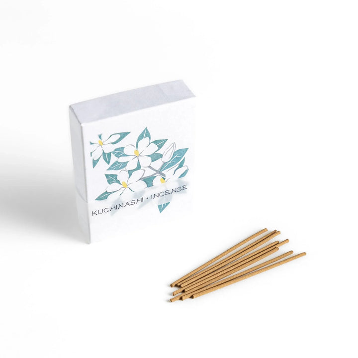 Incense with beige sticks in a gardenia box, offering a rich floral fragrance for a calm and soothing ambiance