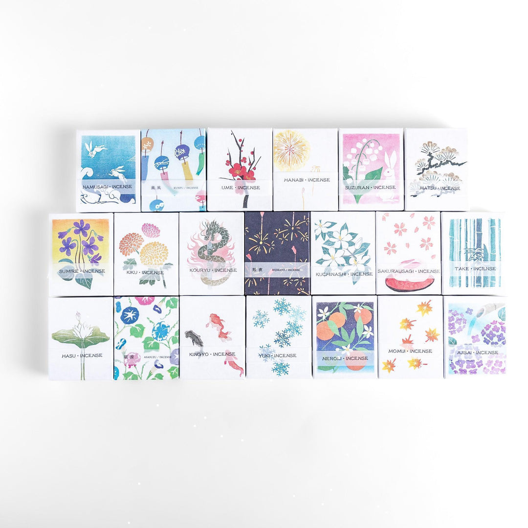 Decorative seashell-shaped incense holders with intricate Japanese designs perfect for elegant ash catching.