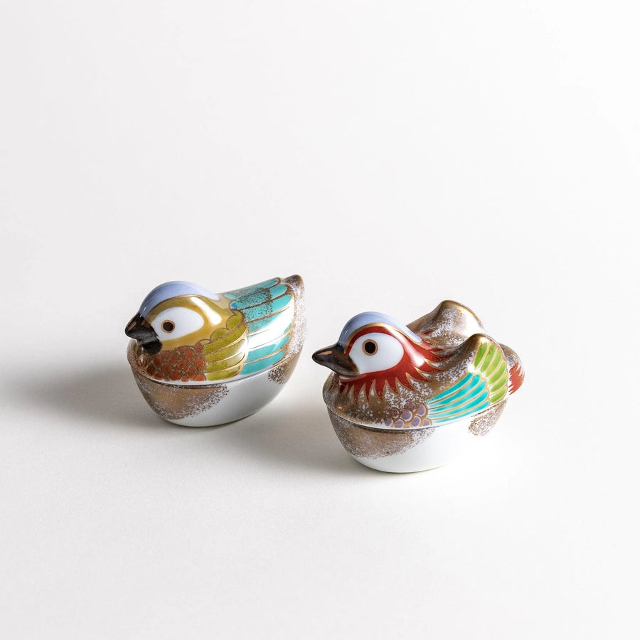 Set of two Japanese bird shaped condiment bowls with golden drake and hen designs in vibrant detailed colors.