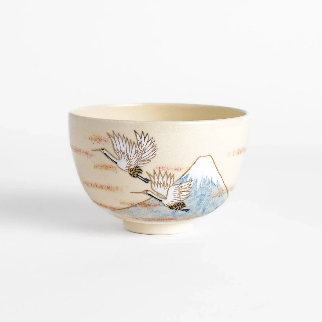 Matcha bowl featuring Mount Fuji and flying cranes with gold accents, adding luxury and tradition to tea ceremonies.