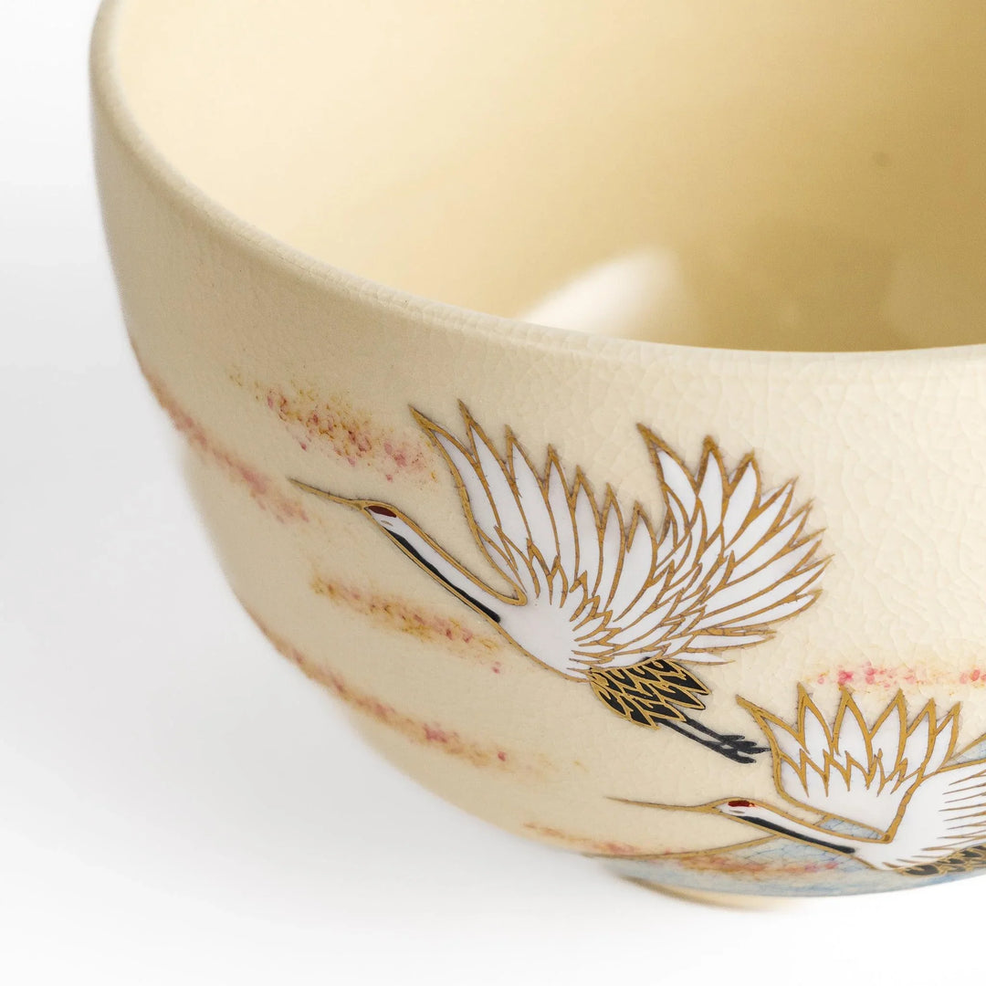 Matcha bowl featuring Mount Fuji and flying cranes with gold accents, adding luxury and tradition to tea ceremonies.