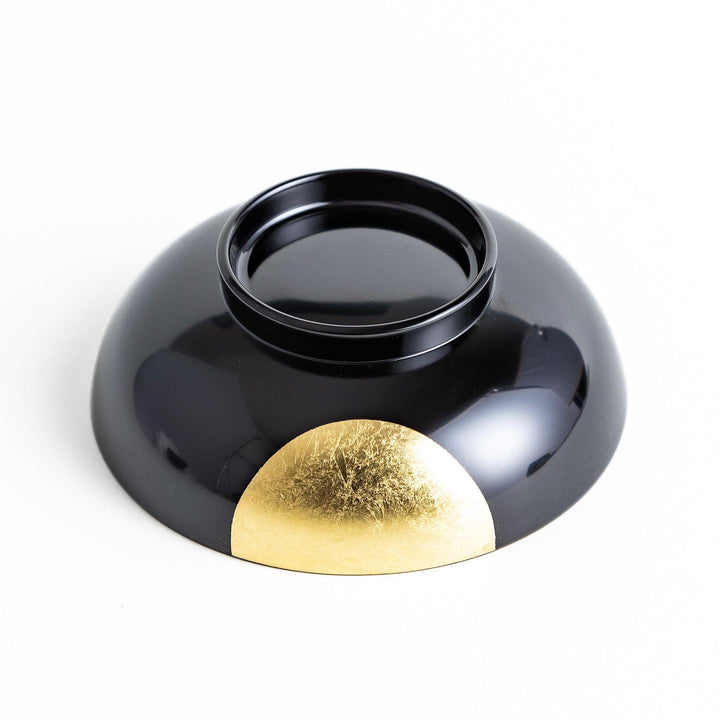 Traditional black lacquer bowl with a golden moon motif on the exterior, featuring a smooth, glossy finish.
