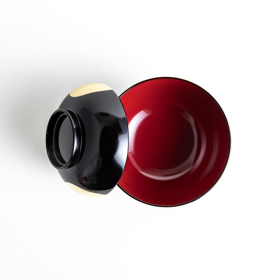 Traditional black lacquer bowl with a golden moon motif on the exterior, featuring a smooth, glossy finish.