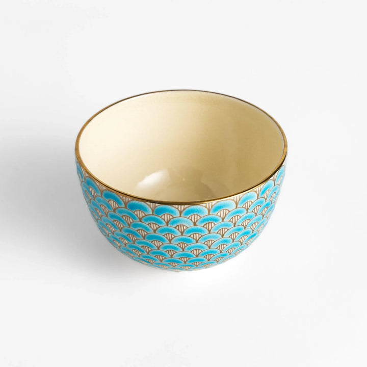 Golden Wave matcha bowl with blue and gold fan pattern and smooth interior perfect for serving matcha in style.