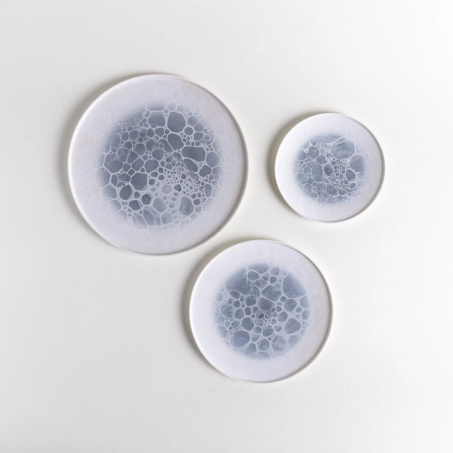 Bubble three piece plate set with delicate bubble patterns arranged from large to small for harmony.