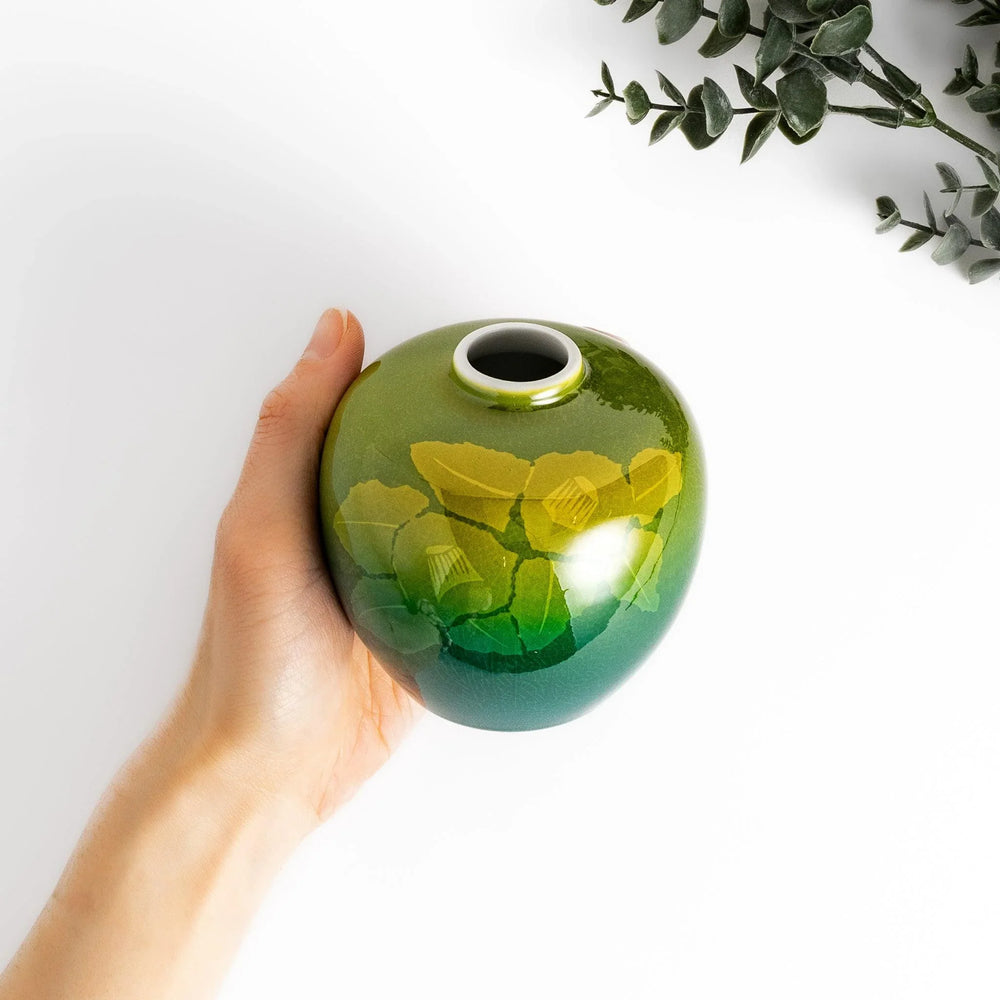 Flower Vase featuring a gradient green design with delicate camellia blossoms, perfect for elegant floral displays.