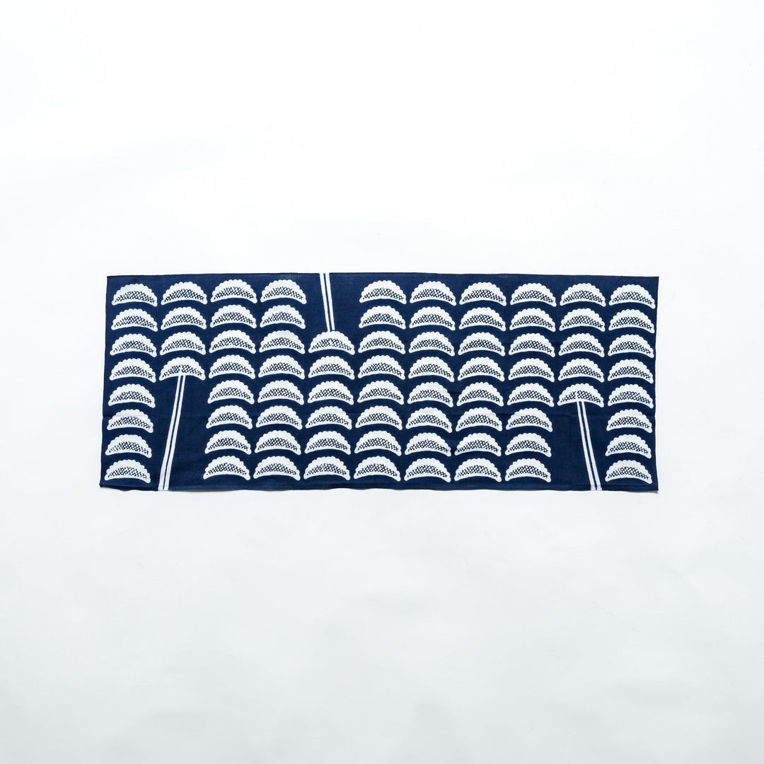 Navy tenugui with white gyoza pattern spread flat showing detailed design on white background.