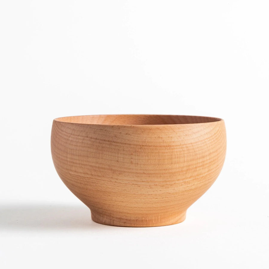 Beech wood bowl showcasing smooth grain and a natural finish. Ideal for serving miso soup or other delicious dishes.