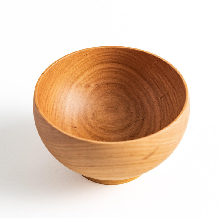 Beautiful wooden bowl featuring a polished interior and elegant design, perfect for presenting your favorite dishes.