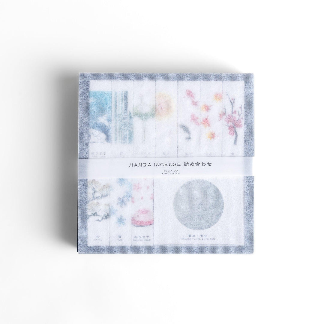 Japanese incense gift set of ten boxes with nature inspired scents and ceramic holder for elegant use.