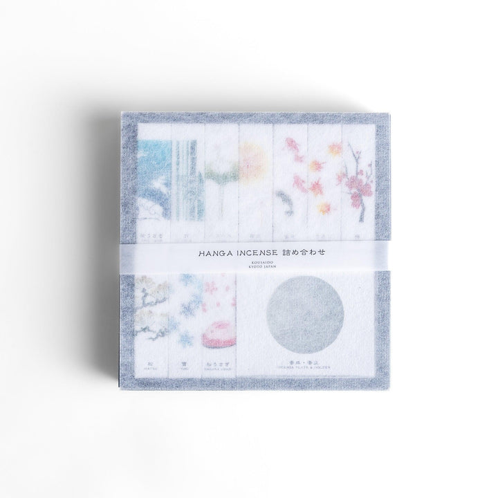 Japanese incense gift set of ten boxes with nature inspired scents and ceramic holder for elegant use.