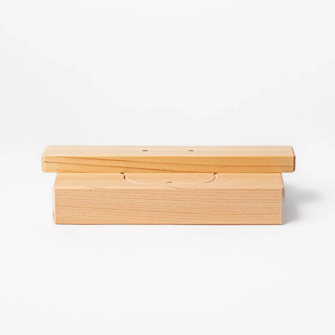 Hinoki onigiri mold in plum blossom shape, perfect for pressing rice into floral forms with a light, natural aroma.