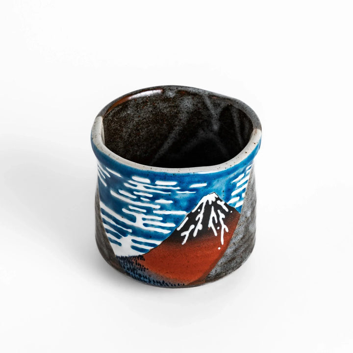 Tea Cups featuring Hokusai's Red Mount Fuji design, with vibrant red, blue, and white colors for a striking display.