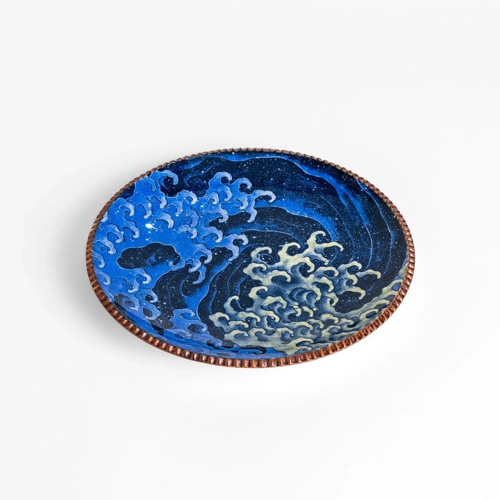 Beautiful ceramic salad plate, featuring a hand-painted Hokusai-inspired wave design, elevates any meal.