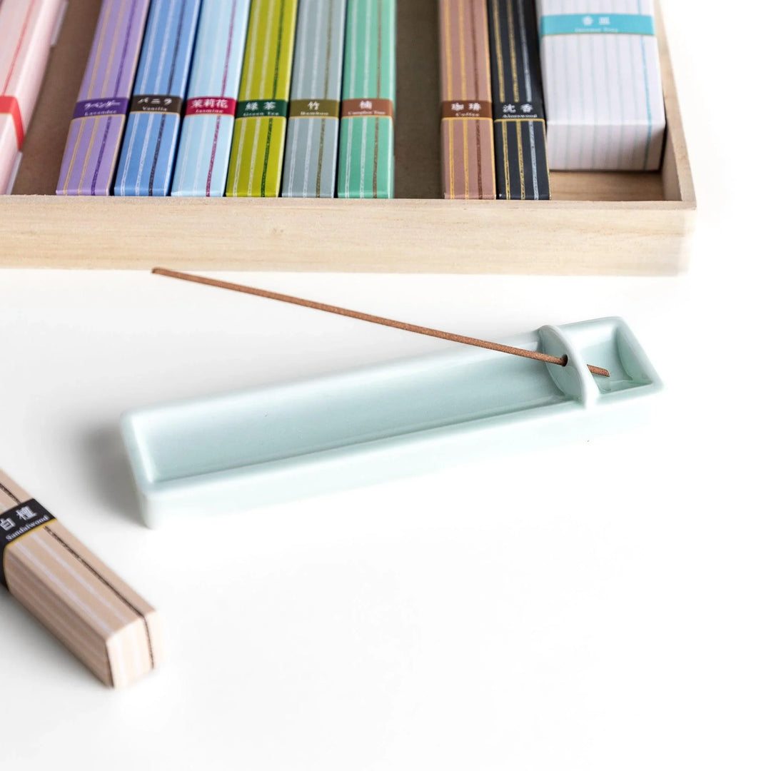 Japanese incense assortment set with 17 colorful fragrances neatly arranged in a wooden box from Kyoto’s Kousaido