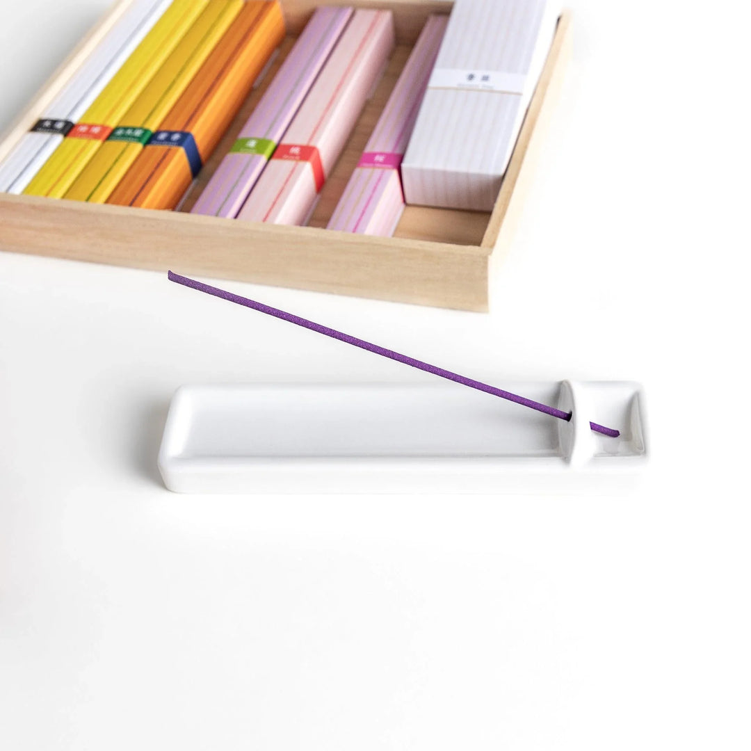 Japanese incense assortment set from Kyoto featuring colorful sticks in floral scents beautifully arranged in a wooden box.