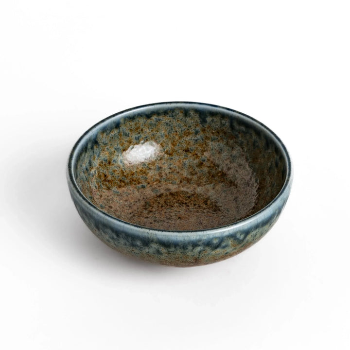 Dessert bowl featuring a beautiful indigo glaze with a stunning ombré effect, transitioning from deep blue to earthy brown