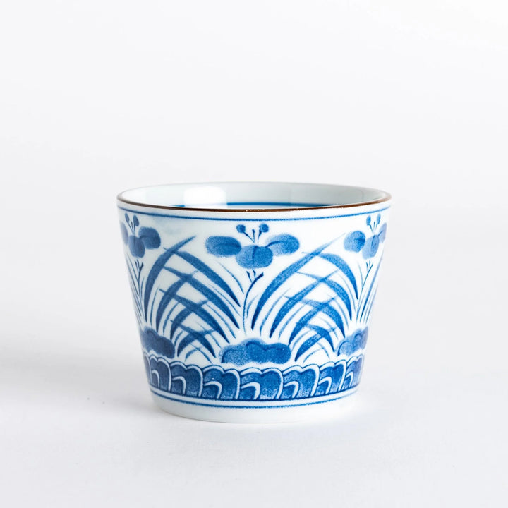 Iris Arabesque Condiment Bowl featuring elegant blue floral arabesque design inspired by Japanese motifs.