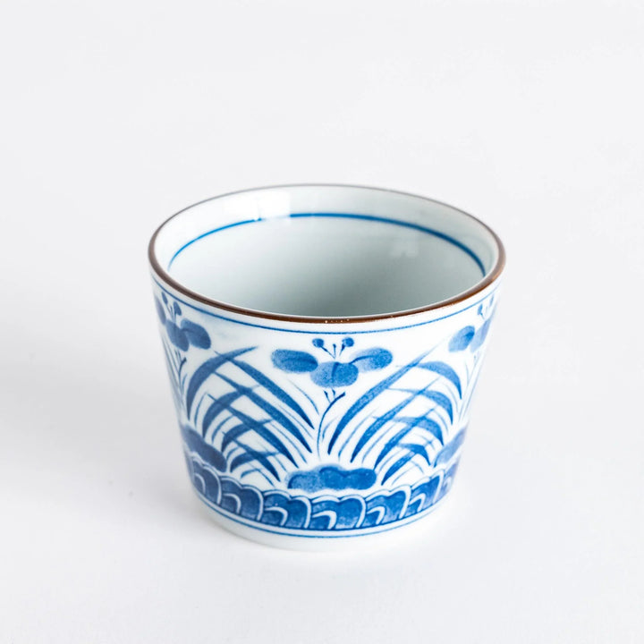 Iris Arabesque Condiment Bowl featuring elegant blue floral arabesque design inspired by Japanese motifs.
