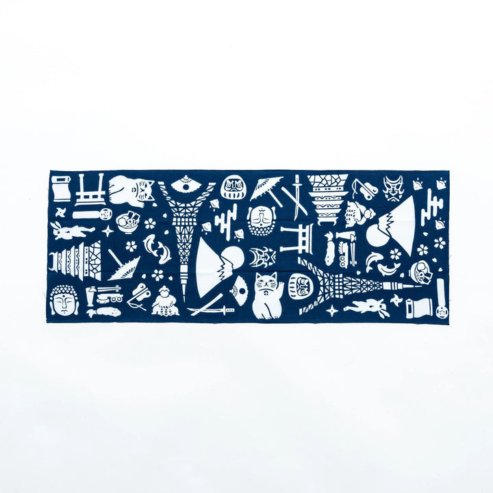 Fully spread dark blue tenugui showcasing intricate white patterns of Japanese cultural icons.