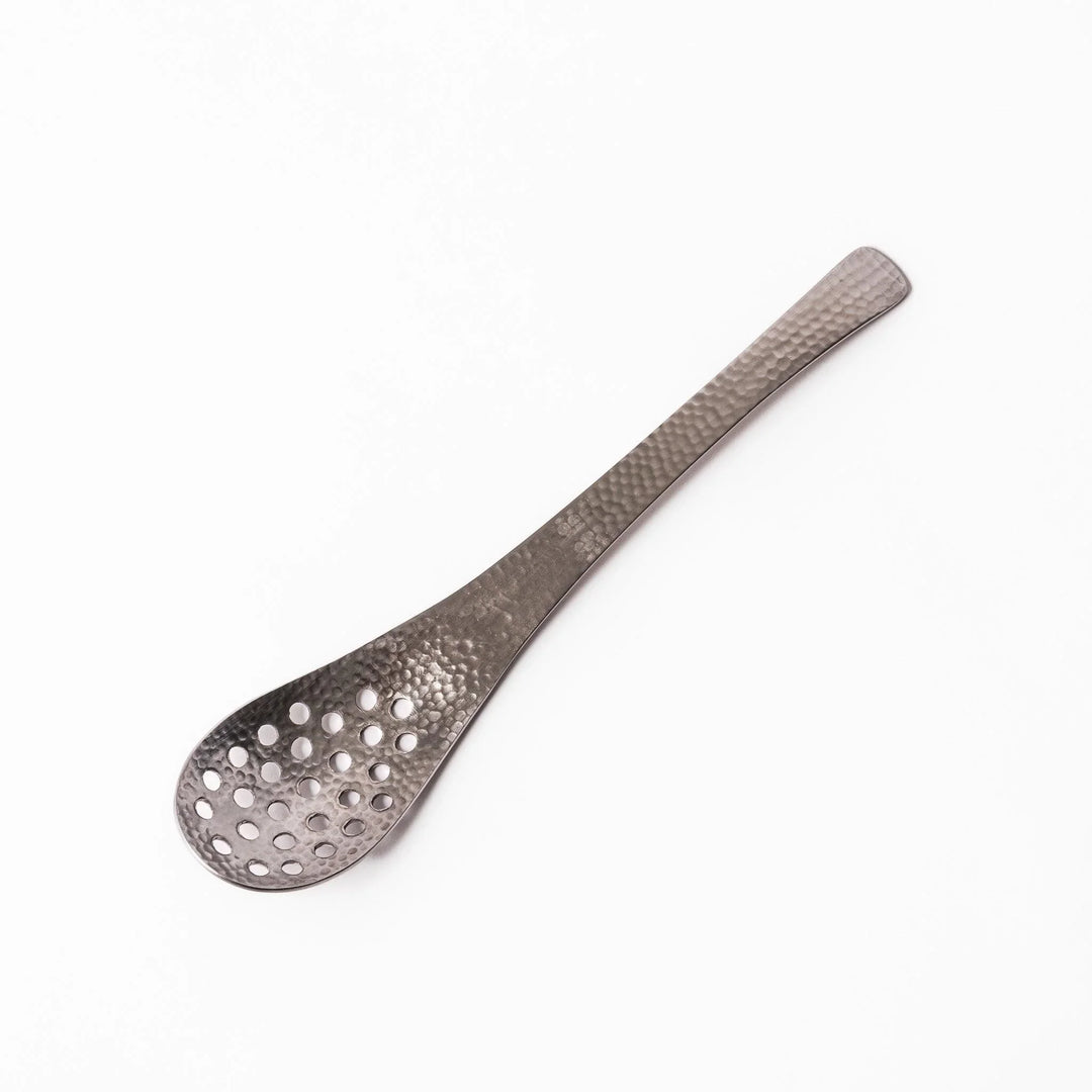 Japanese Hammered Straining Spoon with perforated bowl handcrafted for skimming or serving food easily.