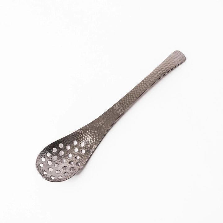 Japanese Hammered Straining Spoon with perforated bowl handcrafted for skimming or serving food easily.