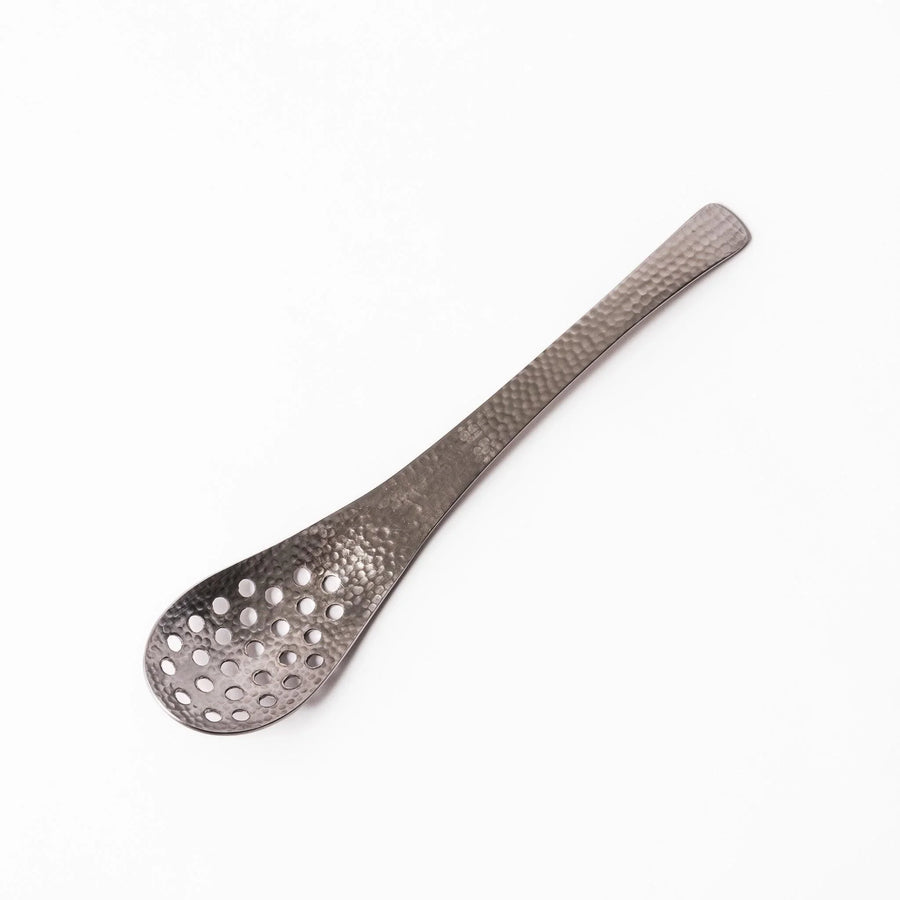 Japanese Hammered Straining Spoon with perforated bowl handcrafted for skimming or serving food easily.