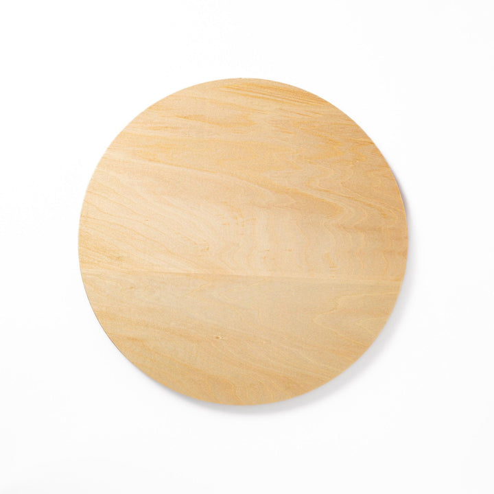 Minimalist Japanese round wooden tray with raised edge for serving tea snacks or organizing small items.
