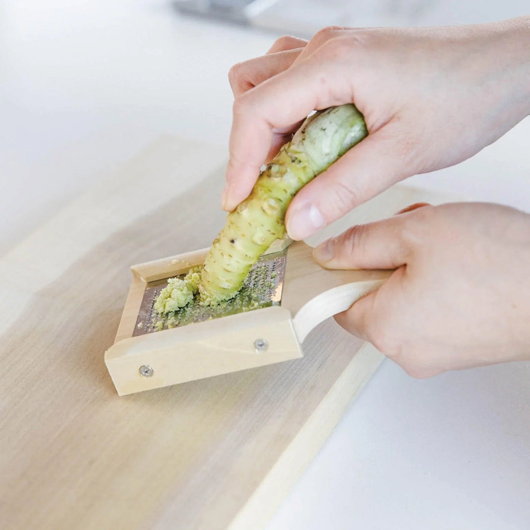 Japanese wood mini grater for wasabi and spices combining practical kitchen use with traditional design.