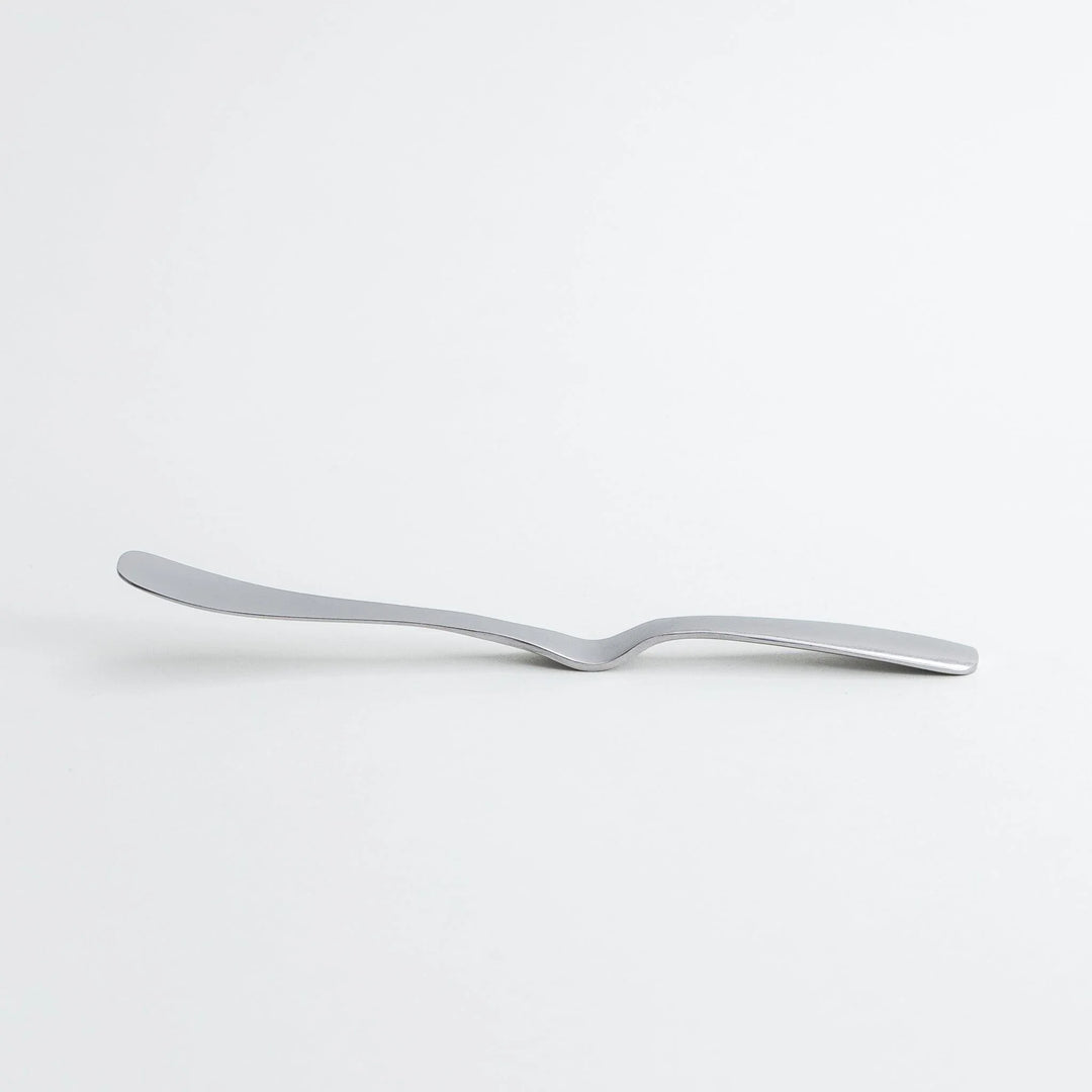 Stainless steel jam spreader with a sleek, double-ended design.