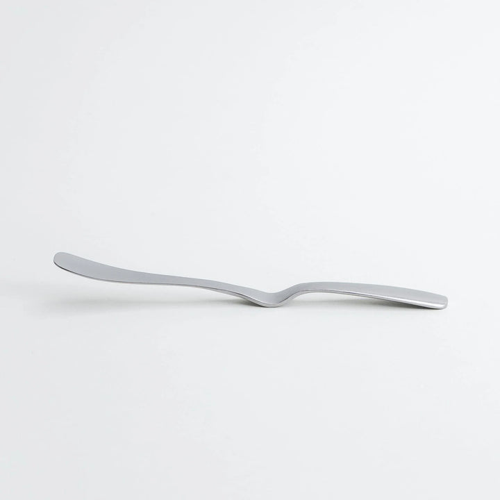 Stainless steel jam spreader with a sleek, double-ended design.