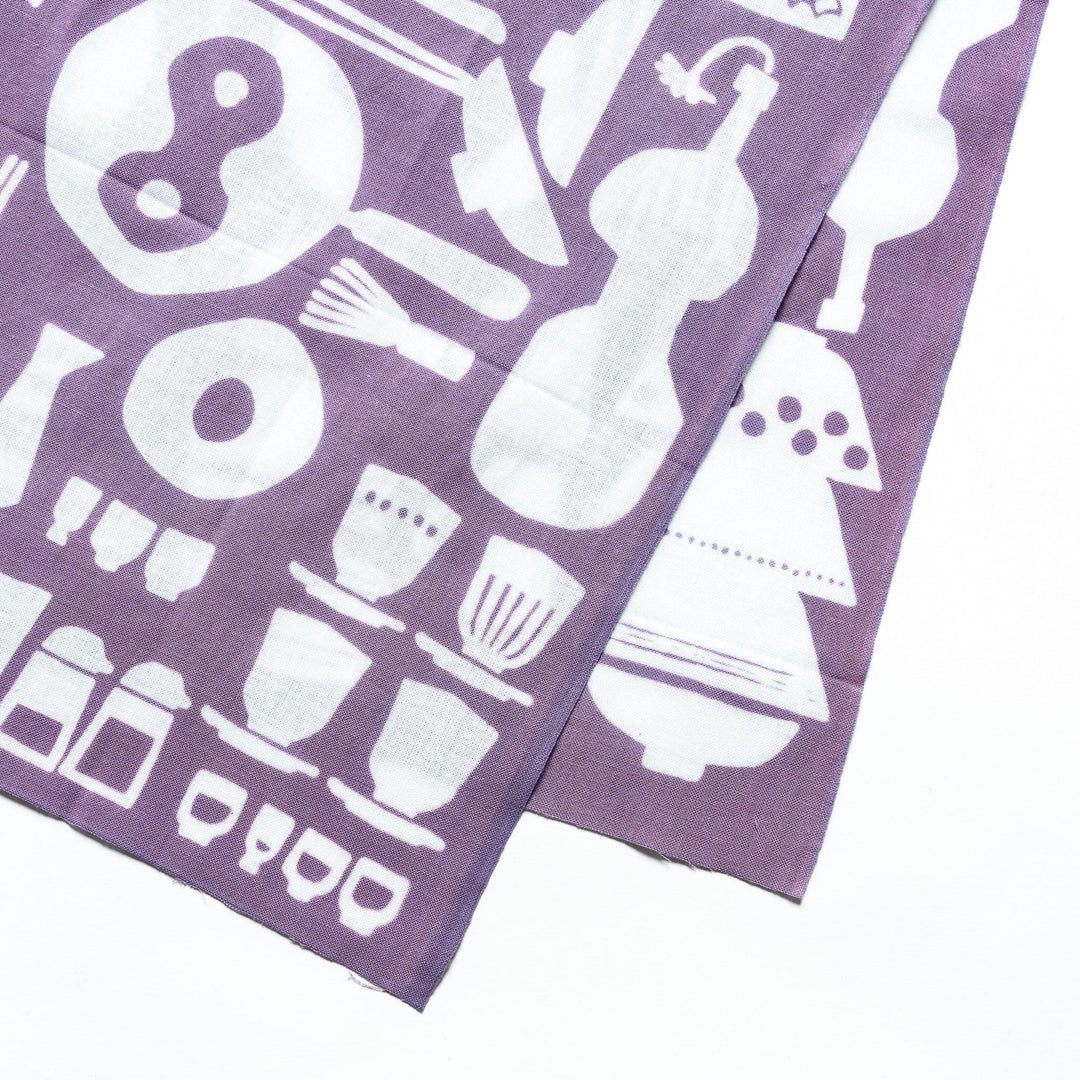 Purple tenugui towel with white kitchenware motifs like bowls and teapots in continuous pattern.