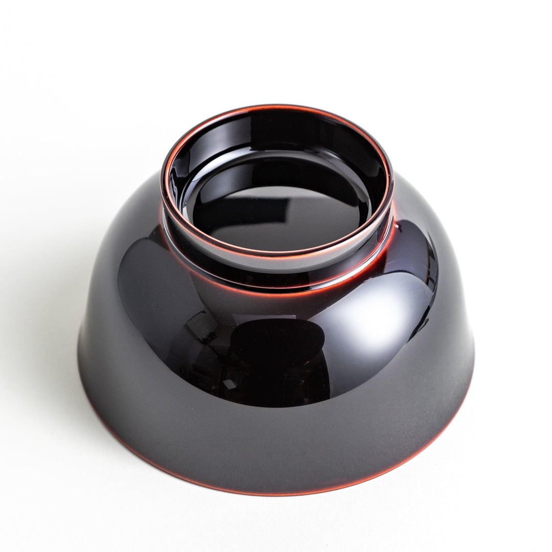 A smooth, glossy lacquer bowl with a minimalist design, perfect for soups or side dishes. Available in red and black.