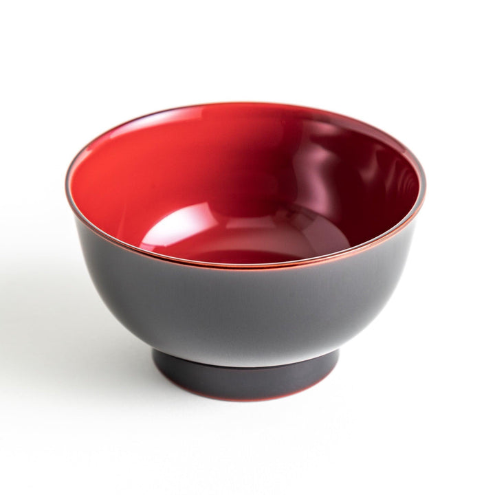 A smooth, glossy lacquer bowl with a minimalist design, perfect for soups or side dishes. Available in red and black.