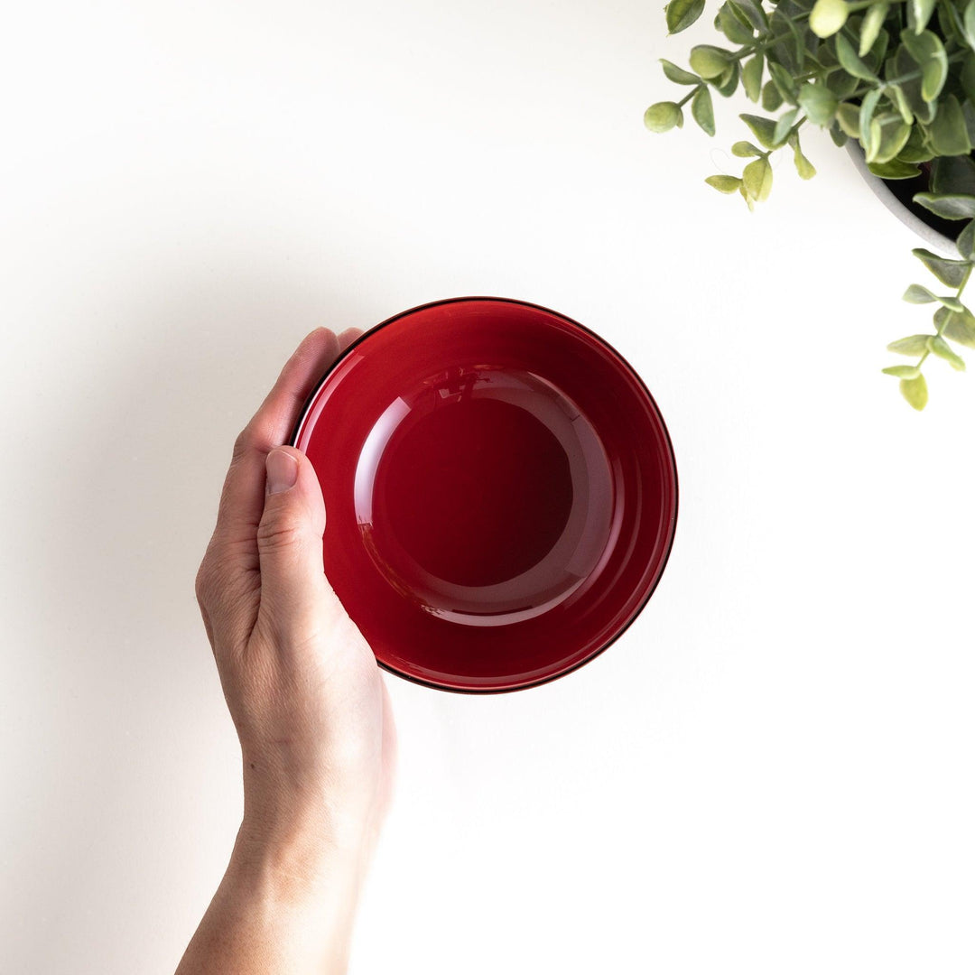 A smooth, glossy lacquer bowl with a minimalist design, perfect for soups or side dishes. Available in red and black.