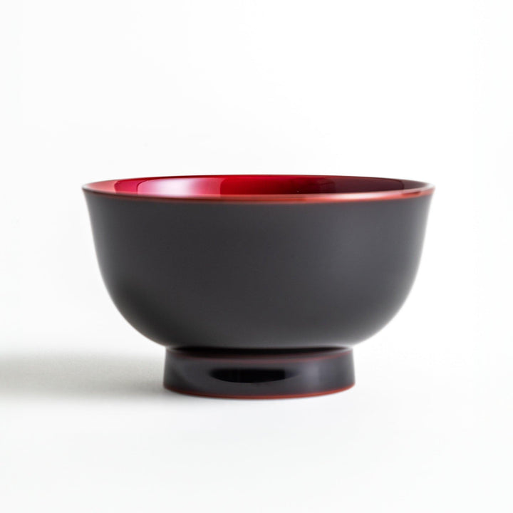 A smooth, glossy lacquer bowl with a minimalist design, perfect for soups or side dishes. Available in red and black.