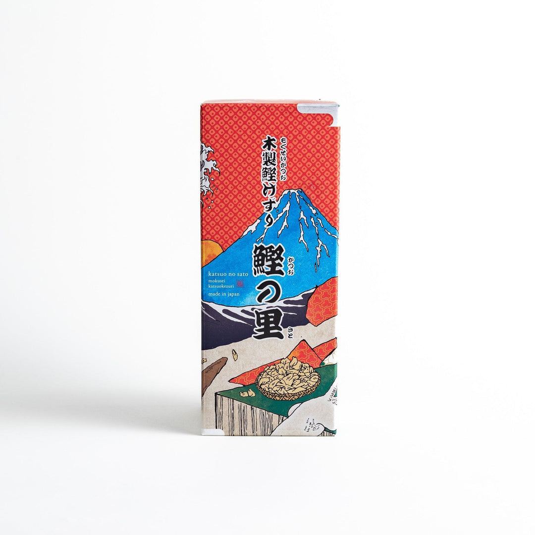 Large wooden katsuobushi shaver box with sliding drawer and lid and colorful Japanese artwork packaging.