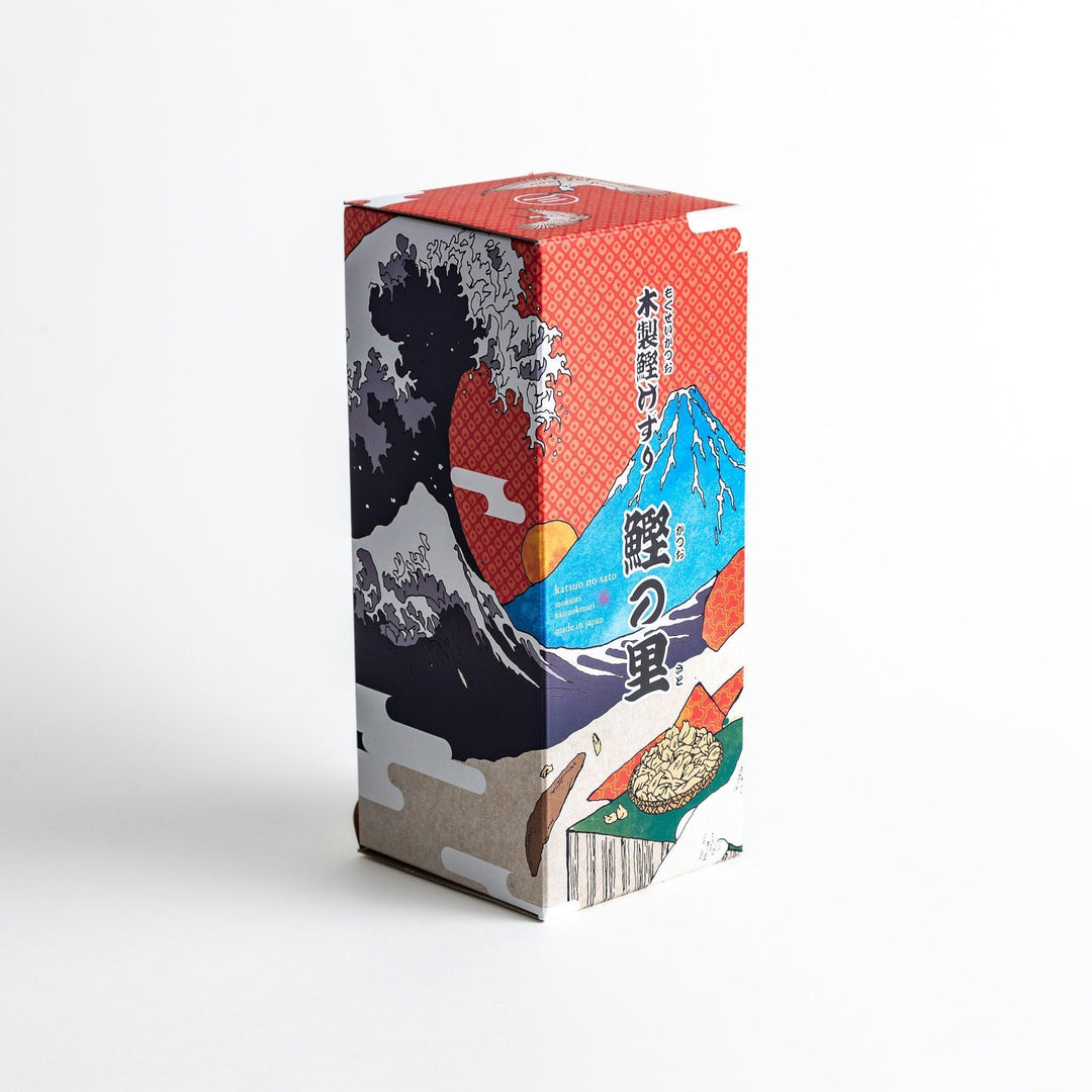 Large wooden katsuobushi shaver box with sliding drawer and lid and colorful Japanese artwork packaging.