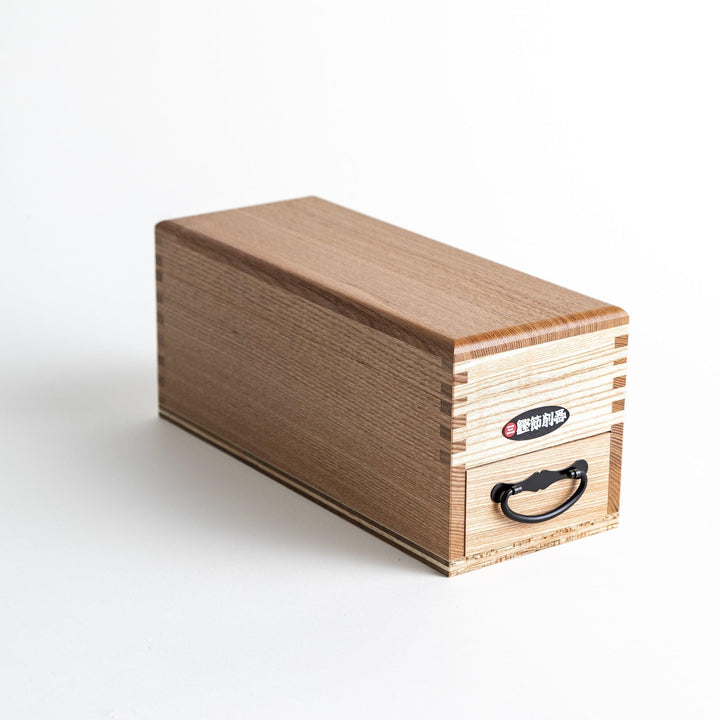Large wooden katsuobushi shaver box with sliding drawer and lid and colorful Japanese artwork packaging.