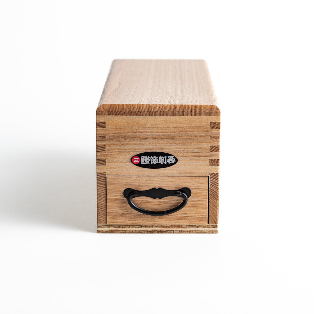 Large wooden katsuobushi shaver box with sliding drawer and lid and colorful Japanese artwork packaging.