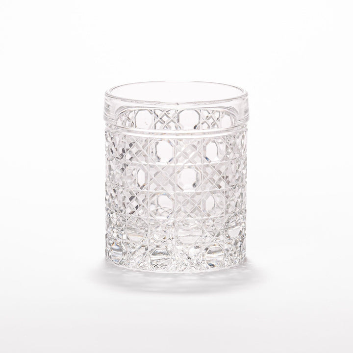 Rocks glass with lattice cut design, perfect for serving whiskey or spirits with a sophisticated touch.